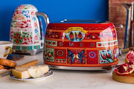 Promo photo showing products from the Smeg x Dolce & Gabbana collection including a kettle, a cup and a toaster