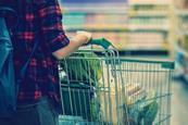 Consumer with shopping trolley