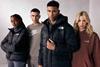 Four models wearing sportswear from JD Sports