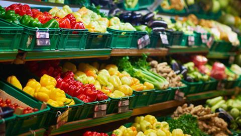 Fresh vegetables on display in supermarket