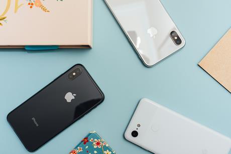 Collection of Apple phones shown from back and above