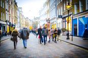 People walking on a busy high street