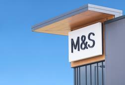 Marks & Spencer sign against blue sky