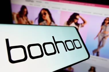 Boohoo logo on phone with models in background