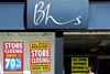 BHS storefront with closing-down signs