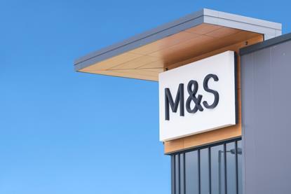 Marks & Spencer sign against blue sky